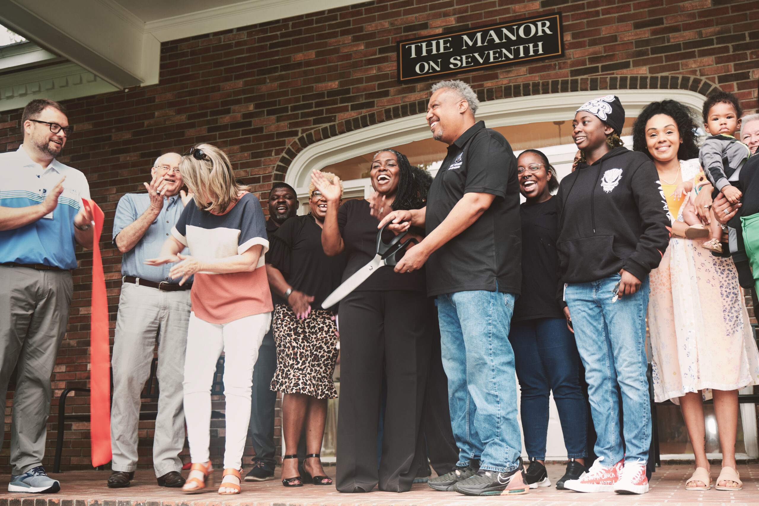 Manor On 7th Ribbon cutting wide